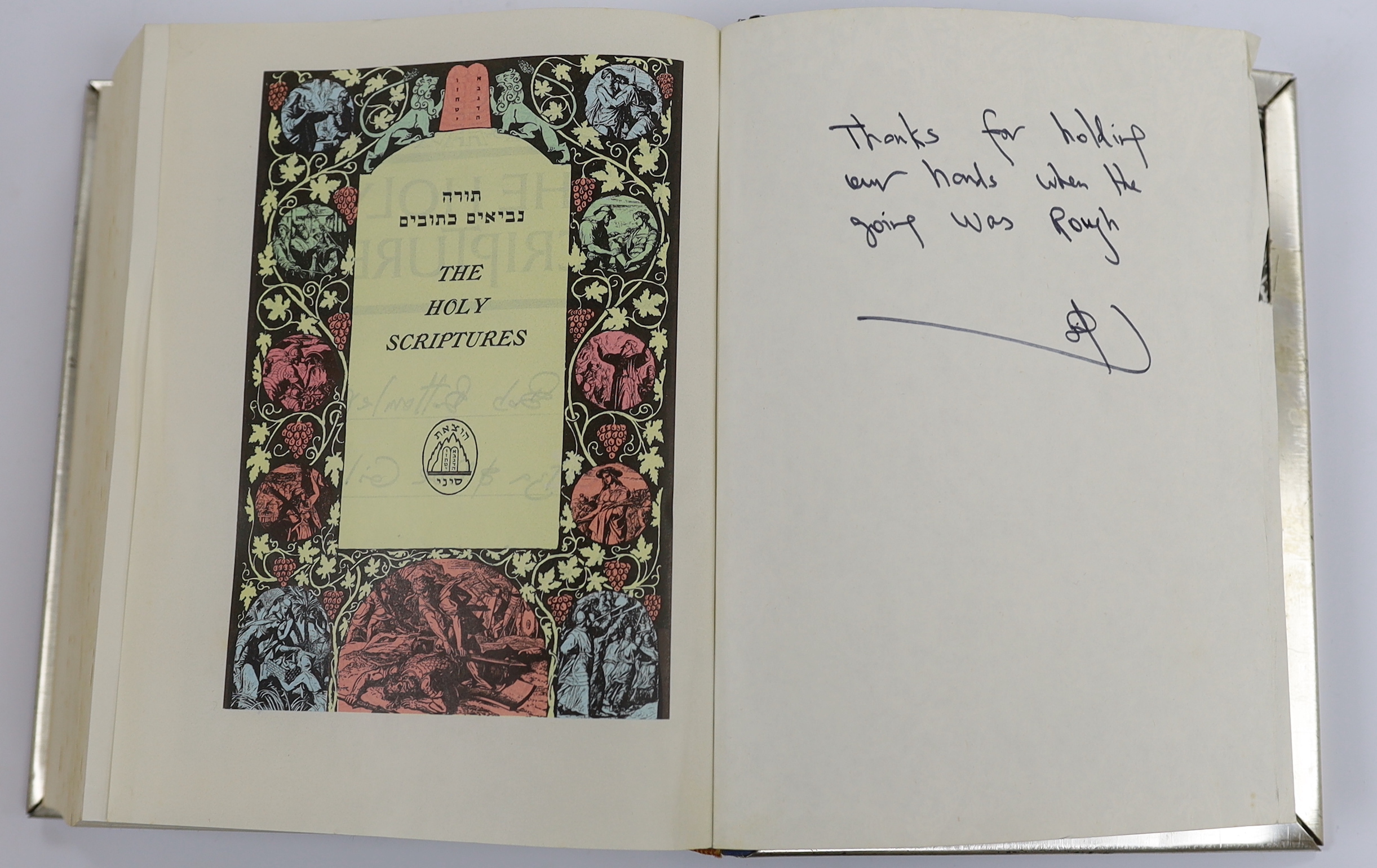 A presentation Jewish Bible (according to the Masoretic text), with ink presentation details and dated 1976, Sinai Publishing, Tel Aviv, with decorative white metal cover and outer slipcase, 25 x 19.5cm